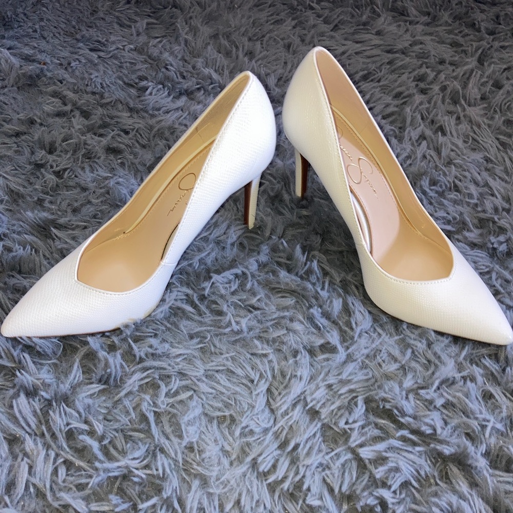Jessica Simpson size 8 white, pointy heel.